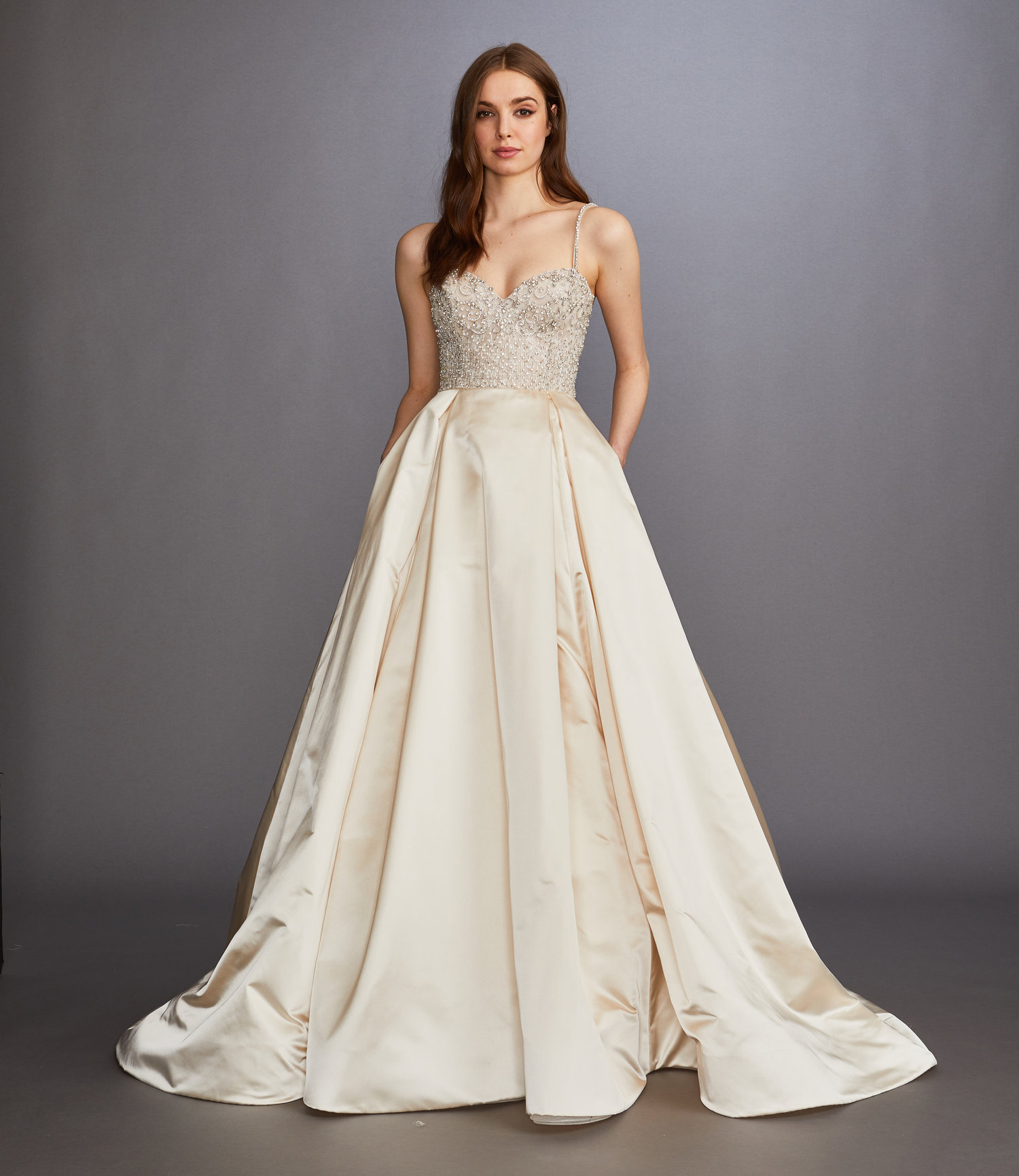 plunging pleated satin ball gown with bow